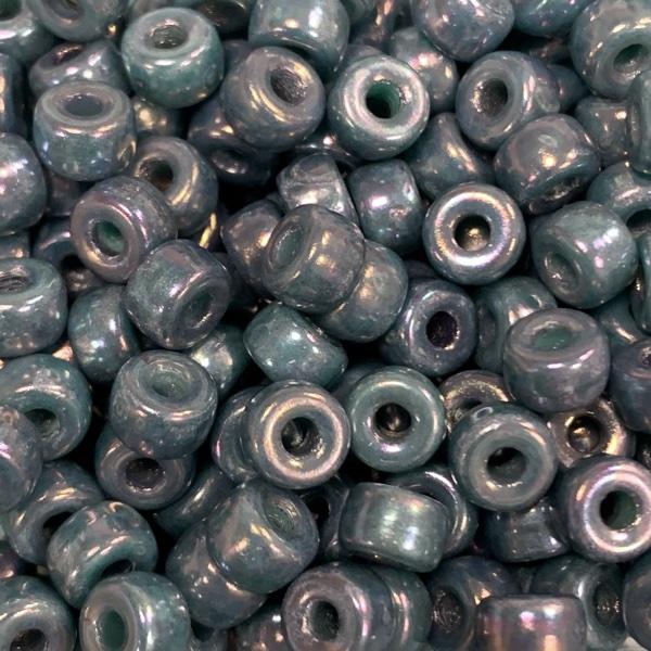 Glaskraal turquoise AB 6mm Ø2mm - 15 stuks
